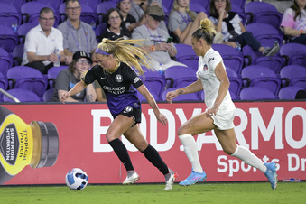 FILE - Orlando Pride midfielder Mikayla Cluff, left, controls the ball in front of Washington Spirit forward Trinity Rodman during an NWSL Challenge Cup soccer match March 19, 2022, in Orlando, Fla. The Utah Royals have traded for midfielder Cluff, making the former BYU standout the NWSL expansion team’s first rostered player. The Royals acquired Cluff and the No. 26 pick in the 2024 NWSL draft in exchange for $90,000 in Allocation Money and expansion protection. (AP Photo/Phelan M. Ebenhack, File)