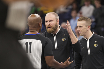 Memphis Grizzlies coach Taylor Jenkins argues with official Derrick Collins after the ejection of forward Jaren Jackson Jr. during the second half of the team's NBA basketball in-season tournament game against the Utah Jazz on Friday, Nov. 10, 2023, in Memphis, Tenn. (AP Photo/Nikki Boertman)