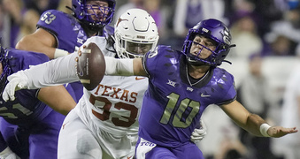 Texas defensive lineman T'Vondre Sweat (93) sacks TCU quarterback Josh Hoover (10) in the first quarter of an NCAA college football game, Saturday, Nov. 11, 2023, in Fort Worth, Texas. (Ricardo B. Brazziell/Austin American-Statesman via AP)