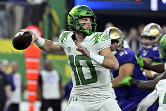FILE -  Oregon quarterback Bo Nix looks to pass against Washington during the first half of the Pac-12 championship NCAA college football game Friday, Dec. 1, 2023, in Las Vegas. (AP Photo/David Becker, File)