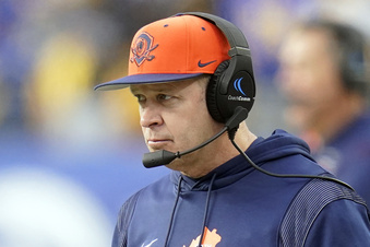 FILE - Virginia head coach Bronco Mendenhall watches from the sideline during an NCAA college football game against Pittsburgh, Saturday, Nov. 20, 2021, in Pittsburgh. New Mexico hired Bronco Mendenhall as its new head football coach Wednesday, Dec. 6, 2023. The 57-year-old Mendenhall compiled a 135-81 record over 17 seasons at BYU and Virginia and was 7-7 in bowl games before he stepped away from coaching following the 2021 season. (AP Photo/Keith Srakocic, File)