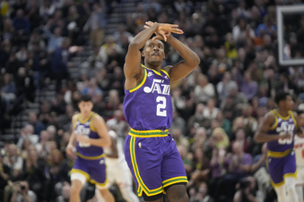 Utah Jazz guard Collin Sexton (2) reacts after scoring against the New York Knicks during the first half of an NBA basketball game Wednesday, Dec. 13, 2023, in Salt Lake City. (AP Photo/Rick Bowmer)