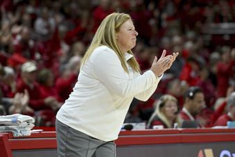 UCLA coach Cori Close reacts on the sideline during the second half of an NCAA college basketball game against Arkansas, Sunday, Dec. 3, 2023, in Fayetteville, Ark. (AP Photo/Michael Woods)