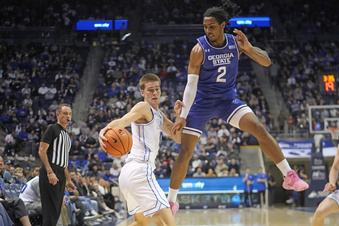 Georgia State forward Jamaine Mann (2) guards BYU forward Noah Waterman during the first half of an NCAA college basketball game Saturday, Dec. 16, 2023, in Provo, Utah. (AP Photo/Rick Bowmer)