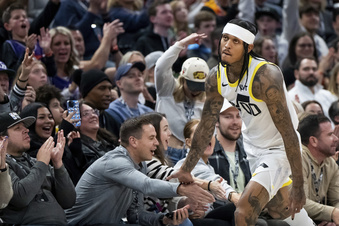 Utah Jazz guard Jordan Clarkson (00) celebrates after hitting a 3-point basket during the first half of an NBA basketball game against the Los Angeles Lakers, Saturday, Jan. 13, 2024, in Salt Lake City. (AP Photo/Spenser Heaps)