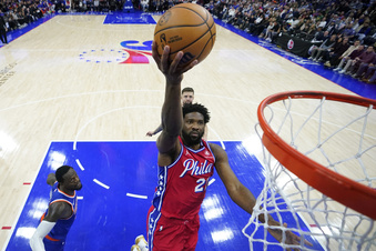 Philadelphia 76ers' Joel Embiid goes up for a shot during the first half of an NBA basketball game against the New York Knicks, Friday, Jan. 5, 2024, in Philadelphia. (AP Photo/Matt Slocum)