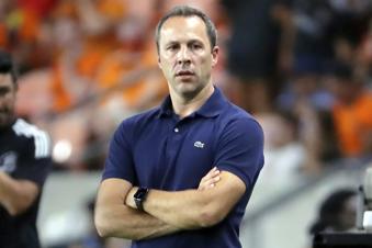 FILE - Los Angeles FC head coach Steve Cherundolo watches from the sidelines during the first half of an MLS soccer match Wednesday, August 31, 2022, in Houston. Cherundolo was fined $10,000 by Major League Soccer on Wednesday, March 6, 2024, for complaining that last weekend's game against Salt Lake was played amid snow and lightning. (AP Photo/Michael Wyke, File)