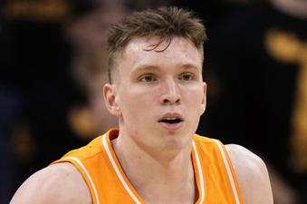FILE - Tennessee guard Dalton Knecht plays during the first half of an NCAA college basketball game against Missouri Tuesday, Feb. 20, 2024, in Columbia, Mo. Knecht is the AP All-SEC player of the year and newcomer of the year in balloting released Tuesday, March 12, 2024.  (AP Photo/Charlie Riedel, File)