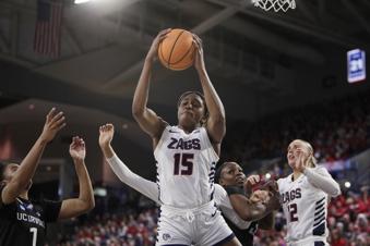 Gonzaga forward Yvonne Ejim (15) grabs a rebound during the first half of the team's first-round college basketball game against UC Irvine in the women's NCAA Tournament in Spokane, Wash., Saturday, March 23, 2024. (AP Photo/Young Kwak)