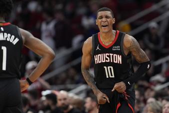 Houston Rockets' Jabari Smith Jr. reacts after getting a technical foul against the Washington Wizards during the second half of an NBA basketball game Thursday, March 14, 2024, in Houston. The Rockets won 135-119. (AP Photo/David J. Phillip)
