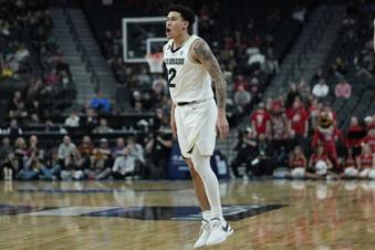 Colorado guard KJ Simpson (2) celebrates after a play against Utah during the second half of an NCAA college basketball game in the quarterfinal round of the Pac-12 tournament Thursday, March 14, 2024, in Las Vegas. (AP Photo/John Locher)