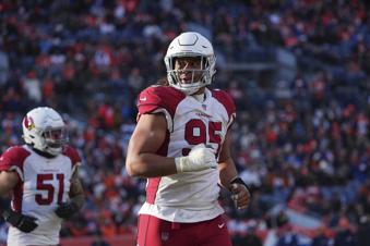 FILE - Arizona Cardinals defensive tackle Leki Fotu (95) against the Denver Broncos of an NFL football game Sunday, December 18, 2022, in Denver. The New York Jets agreed to terms on a contract Tuesday, March 12, 2024, with former Arizona Cardinals defensive tackle Fotu, according to a person with knowledge of the deal. The 25-year-old Fotu brings a run-stopping presence and depth to the Jets' interior defensive line that features Quinnen Williams and John Franklin-Myers. (AP Photo/Bart Young, File)
