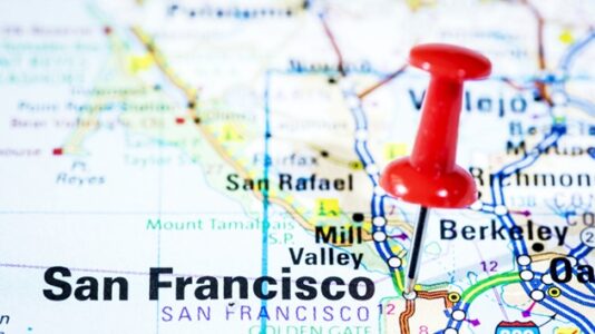 American Airlines flight evacuated via emergency slides after smoke reported during taxiing at San Francisco airport