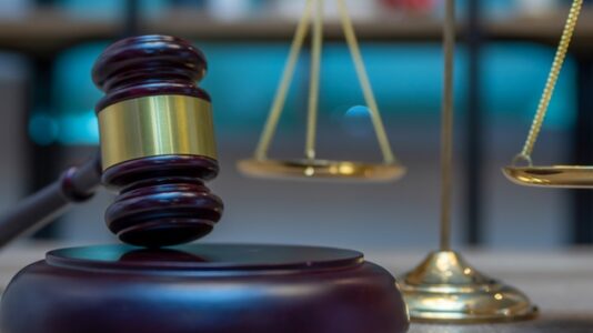 Man who leaped over bench and attacked judge heading to trial