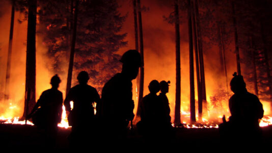 National Guard deployed to help fight raging California fire threatening thousands of homes