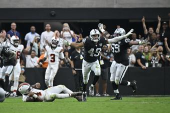 Las Vegas Raiders defensive end Charles Snowden, center, celebrates after sacking Cleveland Browns quarterback Deshaun Watson, left, during the second half of an NFL football game Sunday, Sept. 29, 2024, in Las Vegas. (AP Photo/David Becker)