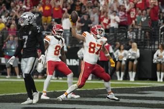 Kansas City Chiefs tight end Travis Kelce (87) celebrates after catching a touchdown pass during the first half of an NFL football game against the Las Vegas Raiders Sunday, Oct. 27, 2024, in Las Vegas. (AP Photo/John Locher)