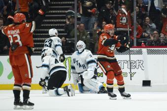 Anaheim Ducks defenseman Pavel Mintyukov (34) reacts after scoring a goal during the second period of an NHL hockey game against the Utah Hockey Club, Wednesday, Oct. 16, 2024, in Anaheim, Calif. (AP Photo/Kyusung Gong)