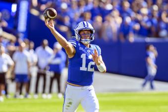 BYU quarterback Jake Retzlaff looks to pass the ball during an NCAA college football game against Arizona, Saturday, Oct. 12, 2024, in Provo, Utah. (AP Photo/Tyler Tate)