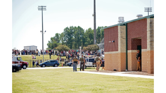 Georgia school shooting suspect hid long gun in poster board on school bus, agent says
