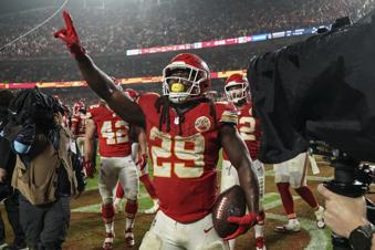 Kansas City Chiefs running back Kareem Hunt (29) celbrates a win over the Tampa Bay Buccaneers in overtime of an NFL football game, Monday, Nov. 4, 2024, in Kansas City, Mo. (AP Photo/Ed Zurga)
