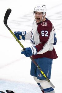 Colorado Avalanche left wing Artturi Lehkonen reacts after scoring a goal during the third period of an NHL hockey game against the Utah Hockey Club, Friday, Dec. 27, 2024, in Salt Lake City. (AP Photo/Rick Egan)