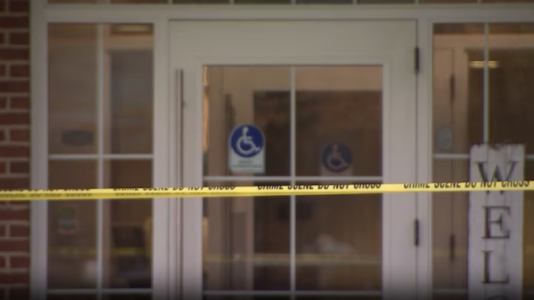Man with chainsaw fatally shot by police inside senior-living facility, officials say