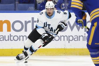 Utah Hockey Club center Nick Schmaltz (8) controls the puck during the second period of an NHL hockey game against the Buffalo Sabres, Saturday, Dec. 7, 2024, in Buffalo, N.Y. (AP Photo/Jeffrey T. Barnes)