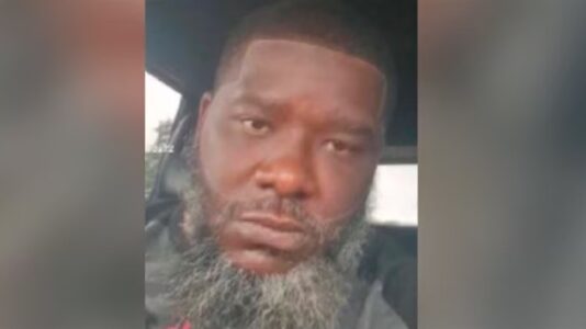 Son gunned down in home invasion fought back, tried to help his mom; suspect at large