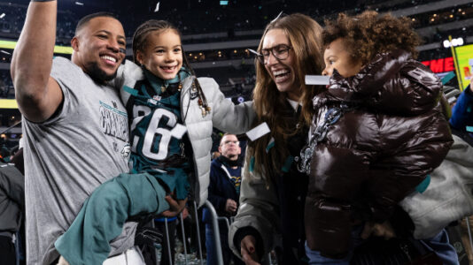 Eagles’ Saquon Barkley shares pregame handshakes with kids: Meet his family