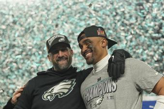 Philadelphia Eagles coach Nick Sirianni, left, quarterback Jalen Hurts celebrate after the Eagles won the NFC Championship NFL football game against the Washington Commanders, Sunday, Jan. 26, 2025, in Philadelphia. (AP Photo/Matt Slocum)
