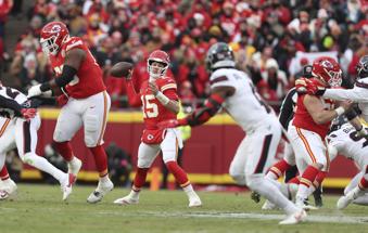 Kansas City Chiefs quarterback Patrick Mahomes (15) throws during the first half of an NFL football AFC divisional playoff game against the Houston Texans Saturday, Jan. 18, 2025, in Kansas City, Mo. (AP Photo/Travis Heying)