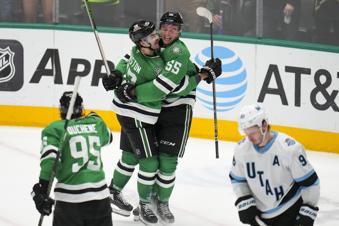 Dallas Stars defenseman Thomas Harley (55) celebrates his game-winning goal with center Wyatt Johnston and center Matt Duchene as Utah Hockey Club defenseman Mikhail Sergachev (98) skates away after during overtime of an NHL hockey game, Saturday, Jan. 4, 2025, in Dallas. The Stars won 3-2 in overtime. (AP Photo/Julio Cortez)
