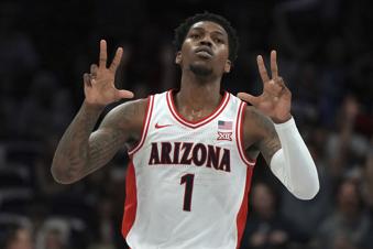 Arizona guard Caleb Love reacts after scoring against Utah during the first half of an NCAA college basketball game, Wednesday, Feb. 26, 2025, in Tucson, Ariz. (AP Photo/Rick Scuteri)