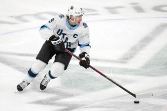 FILE -  Utah Hockey Club center Clayton Keller skates with the puck during an NHL hockey game,, Jan. 4, 2025, in Dallas. (AP Photo/Julio Cortez, File)