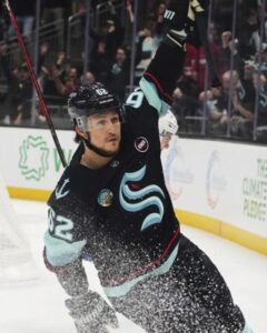 Seattle Kraken defenseman Brandon Montour celebrates scoring a goal for a 5-4 win in overtime against the Montreal Canadiens in an NHL hockey game Wednesday, March 12, 2025, in Seattle. (AP Photo/Lindsey Wasson)