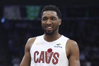 Cleveland Cavaliers guard Donovan Mitchell reacts after a play against the Utah Jazz during the first half of an NBA basketball game, Sunday, March 23, 2025, in Salt Lake City. (AP Photo/Rob Gray)