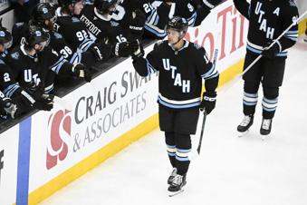 Utah Hockey Club right wing Dylan Guenther (11) celebrates a goal during the third period of an NHL hockey game against the Anaheim Ducks, Wednesday, March 12, 2025, in Salt Lake City. (AP Photo/Alex Goodlett)