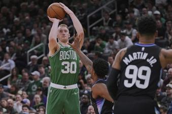 Boston Celtics forward Sam Hauser (30) takes a 3-point shot against the Utah Jazz during the second half of an NBA basketball game, Monday, March 10, 2025, in Boston. (AP Photo/Charles Krupa)