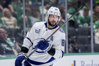 Tampa Bay Lightning right wing Nikita Kucherov (86) skates around the goal during a timeout during an NHL hockey game against the Dallas Stars in Dallas, Thursday, March 20, 2025. (AP Photo/Gareth Patterson)