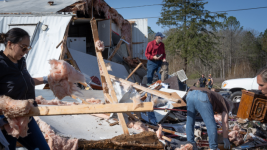 At least 40 killed as dozens of tornados, storms swept the country over the weekend