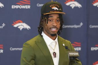Jahdae Barron, a cornerback from Texas who is the Denver Broncos' first-round selection in the NFL football draft, responds to questions during an introductory news conference Friday, April 25, 2025, at the team's headquarters in Centennial, Colo. (AP Photo/David Zalubowski)