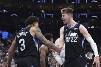 Utah Jazz guard Keyonte George (3) and forward Kyle Filipowski (22) reacts to a play against the Portland Trail Blazers during overtime of an NBA basketball game, Wednesday, April 9, 2025, in Salt Lake City. (AP Photo/Rob Gray)
