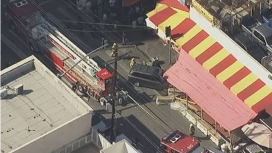 Several injured, including children, after minivan drives into crowd in Los Angeles